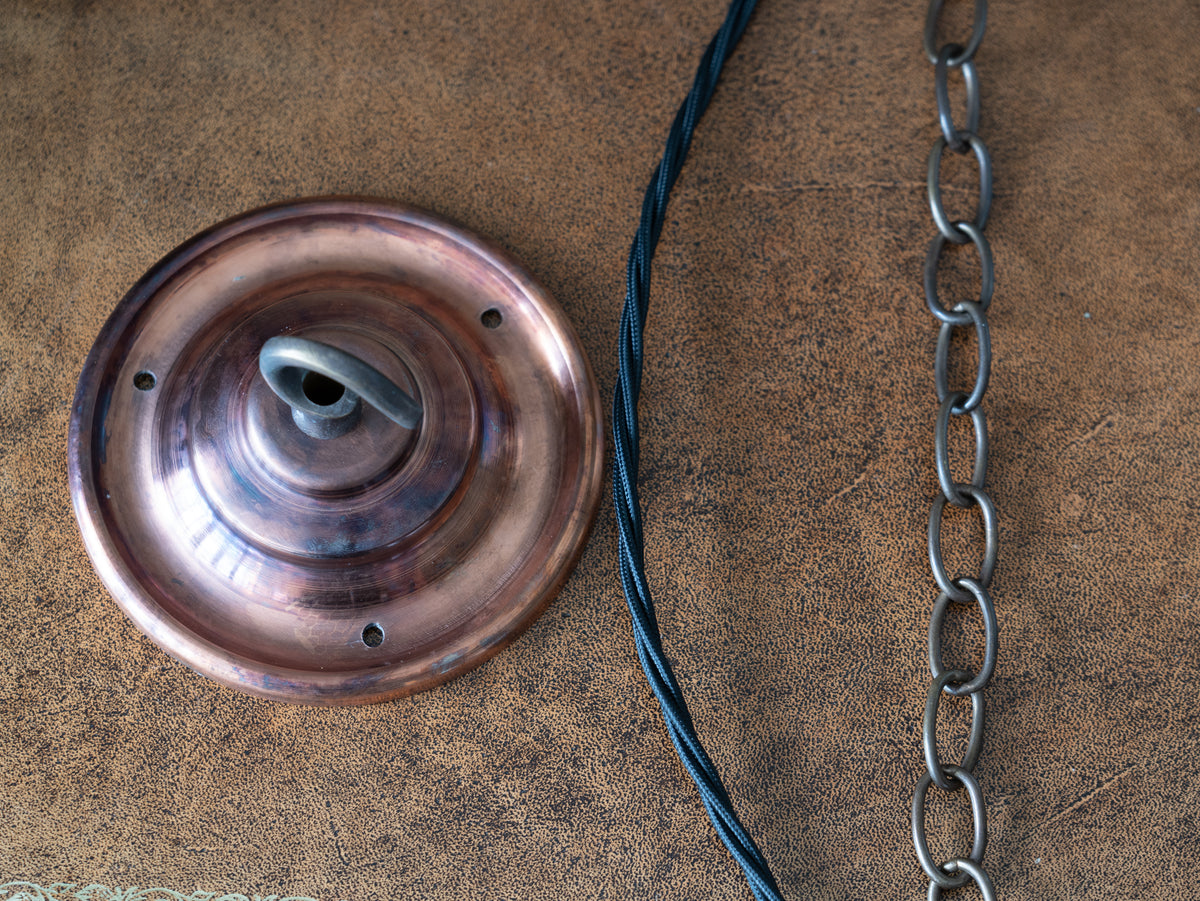 The Eirlys Opaline Glass Pendant in Patinated Copper