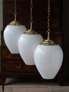 The Eirlys Opaline Glass Pendant in Polished Brass