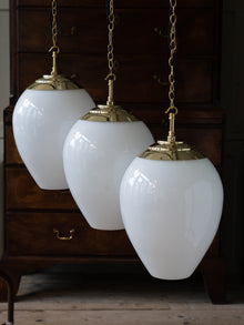 The Eirlys Opaline Glass Pendant in Polished Brass