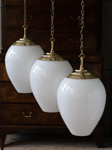 The Eirlys Opaline Glass Pendant in Polished Brass