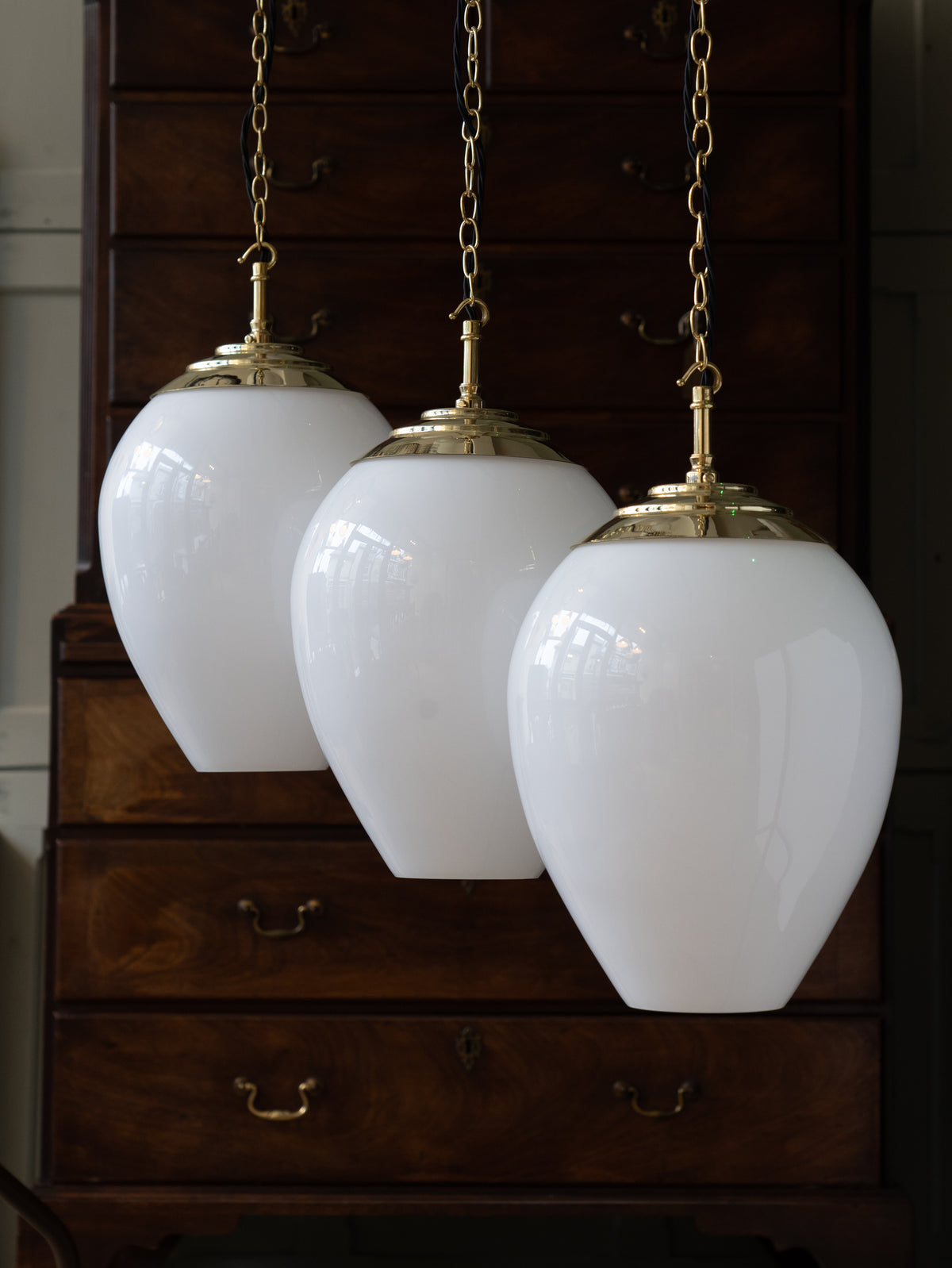 The Eirlys Opaline Glass Pendant in Polished Brass