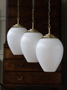 The Eirlys Opaline Glass Pendant in Polished Brass