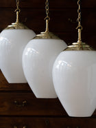 The Eirlys Opaline Glass Pendant in Polished Brass