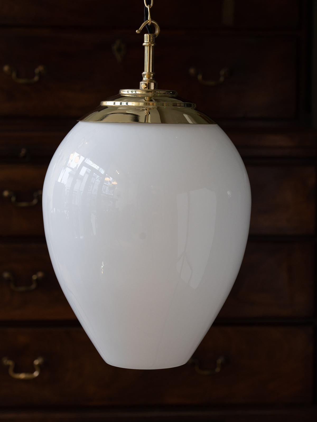 The Eirlys Opaline Glass Pendant in Polished Brass