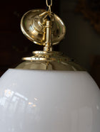 The Eirlys Opaline Glass Pendant in Polished Brass